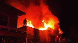 An Oakland, CA, firefighter works to douse flames during a two-alarm fire that broke out at a vacant home in the city's Fruitvale district early Thursday. An Oakland, CA, firefighter works to douse flames during a two-alarm fire that broke out at a vacant home in the city's Fruitvale district early Thursday.