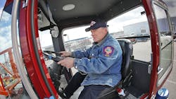 Quincy, MA, firefighter Mike Worley gets behind the wheel of the department's new tiller truck. Quincy, MA, firefighter Mike Worley gets behind the wheel of the department's new tiller truck.