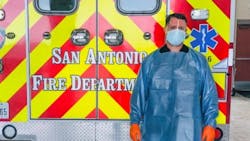A San Antonio, TX, firefighter shows the personal protective equipment that is being worn to handle potential coronavirus cases.