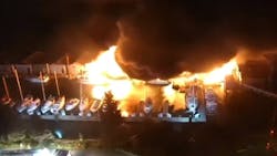 Multiple boats were engulfed in flames after a fire broke out at a marina under the West Seattle Bridge late Friday. Multiple boats were engulfed in flames after a fire broke out at a marina under the West Seattle Bridge late Friday.
