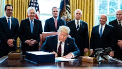 President Donald Trump signs H.R. 748, a $2 trillion economic stimulus bill that will try to help counteract the disruption caused by the COVID-19 pandemic. President Donald Trump signs H.R. 748, a $2 trillion economic stimulus bill that will try to help counteract the disruption caused by the COVID-19 pandemic.