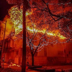 Flames engulfs the roof of an abandoned home as Jacksonville, FL, firefighters began battling it early Monday. Flames engulfs the roof of an abandoned home as Jacksonville, FL, firefighters began battling it early Monday.