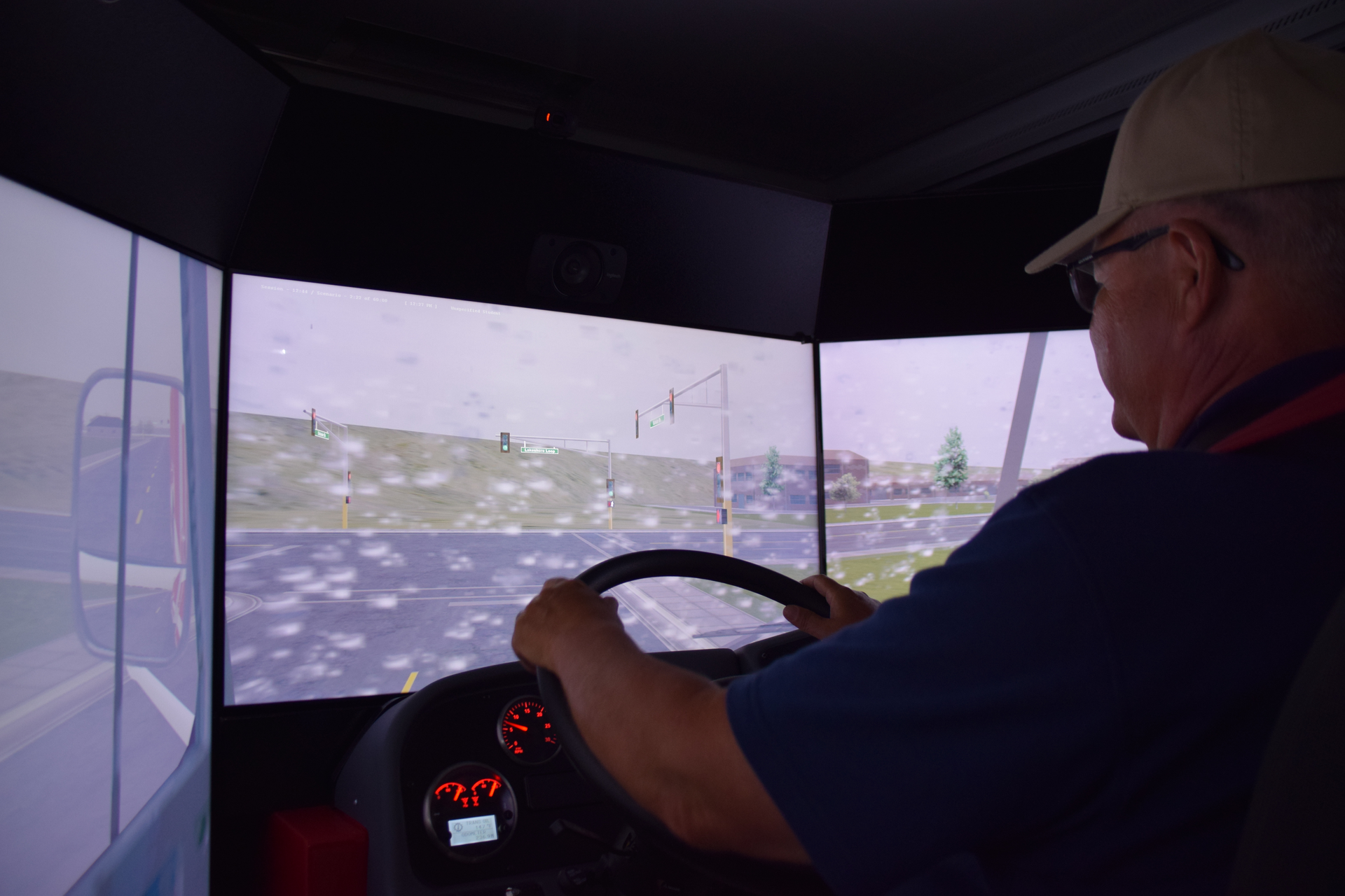 Emergency vehicle simulators can be set to challenge the driver trainee with adverse weather conditions, intersections and speeding automobiles.