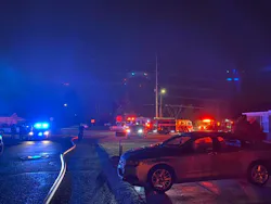 A neighbor called 9-1-1 after a man knocked on her door to report the fire. A neighbor called 9-1-1 after a man knocked on her door to report the fire.