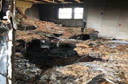 Fellow members stayed in contact with the firefighter who fell through the floor by having him hold onto tools and webbing. They told him not to search for stairs out of the basement, because conditions in the smoke-filled basement were unknown. He stayed put until an attic ladder was lowered into the hole. Fellow members stayed in contact with the firefighter who fell through the floor by having him hold onto tools and webbing. They told him not to search for stairs out of the basement, because conditions in the smoke-filled basement were unknown. He stayed put until an attic ladder was lowered into the hole.