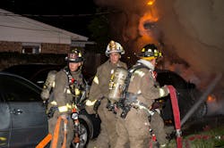 When staffing is limited, water from the exterior is better than a significant delay of getting water inside to the seat of the fire or no water at all. Here, an incident commander is ordering “fast water” via a bigger hoseline that will be manned by one firefighter, while two additional 1¾-inch lines are standing fast for rapid entry after the big line knocks the fire back. When staffing is limited, water from the exterior is better than a significant delay of getting water inside to the seat of the fire or no water at all. Here, an incident commander is ordering “fast water” via a bigger hoseline that will be manned by one firefighter, while two additional 1¾-inch lines are standing fast for rapid entry after the big line knocks the fire back.