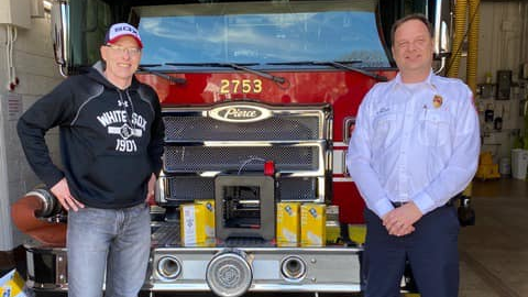 Midlothian, IL, Fire Department recently received gloves from Bremen High School District 228, and the school system is letting firefighters use two 3D printers to make protective masks. Fire Chief Stephen Hotwagner accepted the donations from Bremen High School Principal David Kibelkis.