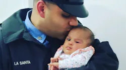 FDNY firefighter Jerel La Santa with his infant daughter, Jay-Natalie, who died of COVID-19.