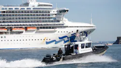 San Francisco police escort the coronavirus-stricken Grand Princess on its way to dock at the Port of Oakland on March 9.