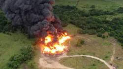 Mid-County, TX, firefighters contained a massive blaze that was sparked by lightning possibly striking oil tanks in Caldwell County early Wednesday. Mid-County, TX, firefighters contained a massive blaze that was sparked by lightning possibly striking oil tanks in Caldwell County early Wednesday.