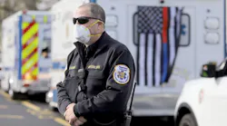Bil Rosen, chief of Neptune, NJ, EMS, before the start of a memorial drive-by for Robert Weber. He was an active member of the Middletown Township First Aid & Rescue Squad and died from COVID-19.
