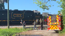 Ocala, FL, firefighters rescued a person who was struck by and pinned underneath a train Monday.