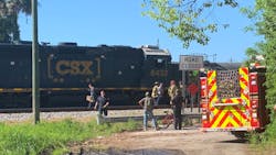 Ocala, FL, firefighters rescued a person who was struck by and pinned underneath a train Monday.
