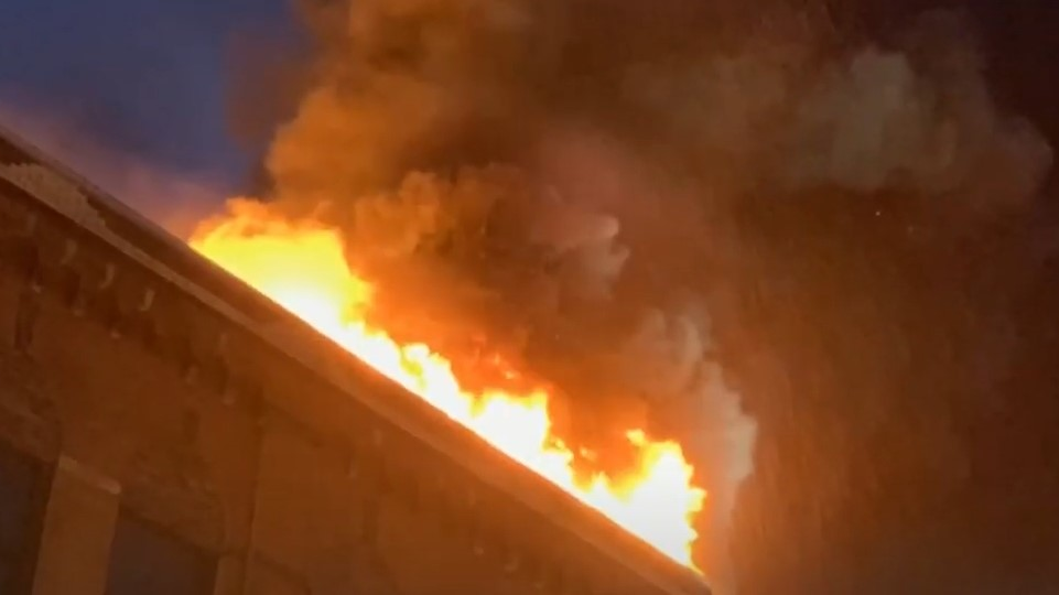 A Pittsburgh firefighter suffered a shoulder injury while battling a large commercial blaze Wednesday.