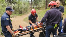 Spokane Valley, WA, firefighters rescue a boy who fell around 40 feet from a cliff while hiking Wednesday in the Dishman Hills Conservation Area. Spokane Valley, WA, firefighters rescue a boy who fell around 40 feet from a cliff while hiking Wednesday in the Dishman Hills Conservation Area.