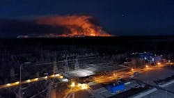 Forest fires rage in the background near the Chernobyl exclusion site in Ukraine. Forest fires rage in the background near the Chernobyl exclusion site in Ukraine.