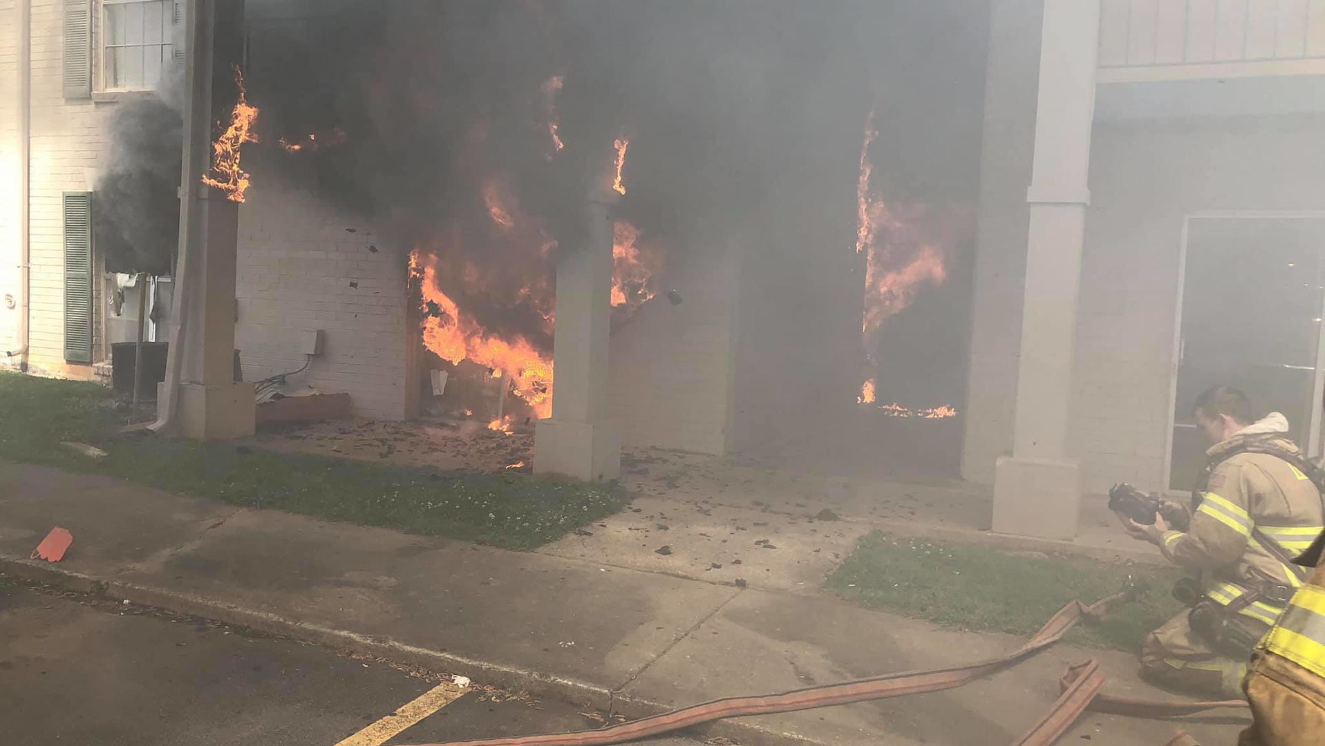 DeKalb County firefighters prepare to battle an apartment fire on Indian Creek Way in Clarkston Thursday.