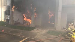 DeKalb County firefighters prepare to battle an apartment fire on Indian Creek Way in Clarkston Thursday.