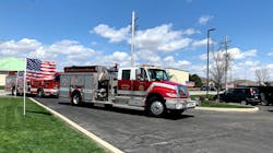 A number of fire apparatus passed by former fire chief Vincent Woodward's home as he celebrated his 100th birthday with his family inside. A number of fire apparatus passed by former fire chief Vincent Woodward's home as he celebrated his 100th birthday with his family inside.