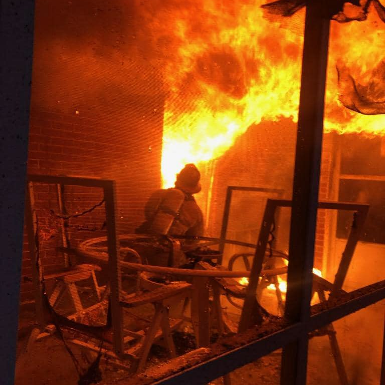 DeKalb County, GA, firefighters battled a residential fire near Decatur on Tuesday that left at least one firefighter injured.