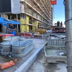 Normal debris found around the construction site. Note the curb and how far material extends into the roadway. Where is the access point? Can you find the hydrant? Normal debris found around the construction site. Note the curb and how far material extends into the roadway. Where is the access point? Can you find the hydrant?