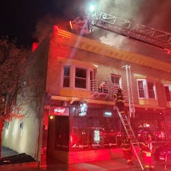 Rochester firefighters use a hand ladder to rescue a resident during a four-alarm fire on Tuesday, April 28, 2020. Rochester firefighters use a hand ladder to rescue a resident during a four-alarm fire on Tuesday, April 28, 2020.