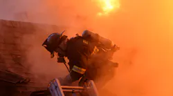 When cutting the residential vertical ventilation hole, when possible, take into account wind direction for deciding on which side of a peaked roof to ventilate. Strong winds can push smoke that emits from the vent hole back into the attic space or at least limit the release of pressurized smoke and heat.