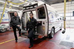 Capt. Keith Ledger, left, and parademic Megan Carr at one of their ambulances used to transport coronavirus patients at the Upper Merion Fire and EMS station in King of Prussia, Pa.