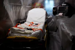 A ambulance that has been wrapped in plastic sheeting for transporting coronavirus patients inside the Upper Merion Fire and EMS station.
