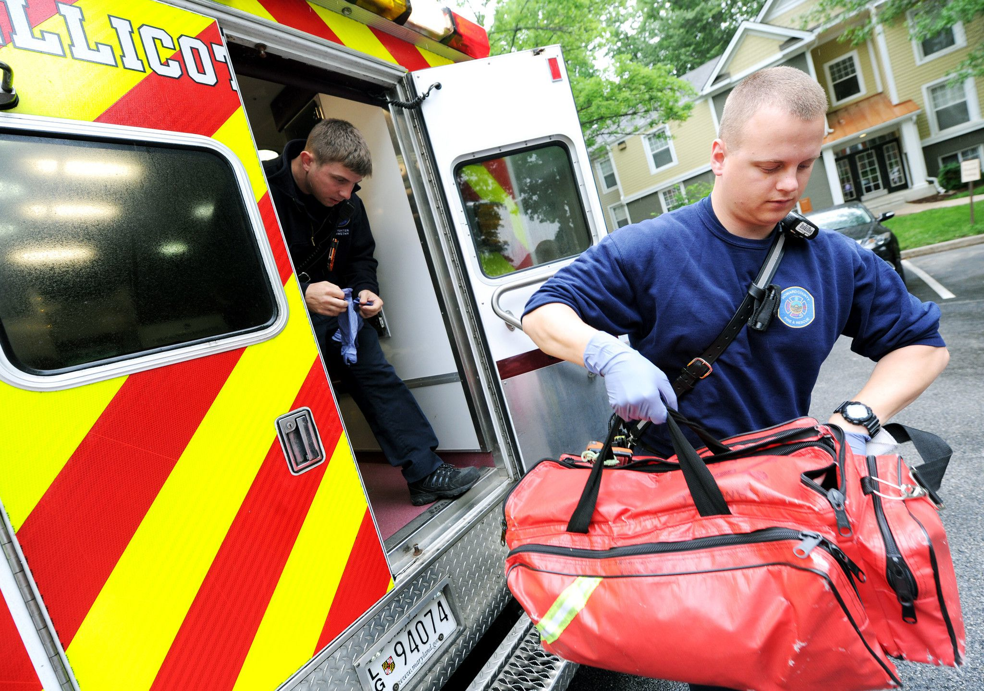 Howard County, MD, paramedic Alex McWethy, left, and EMT Nate Martin prepare to respond to a call for a patient with abdominal pain in this undated photo.
