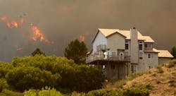 The Waldo Canyon fire burns into the Mountain Shadows neighborhood of Colorado Springs, CO, in June 2012. The Waldo Canyon fire burns into the Mountain Shadows neighborhood of Colorado Springs, CO, in June 2012.