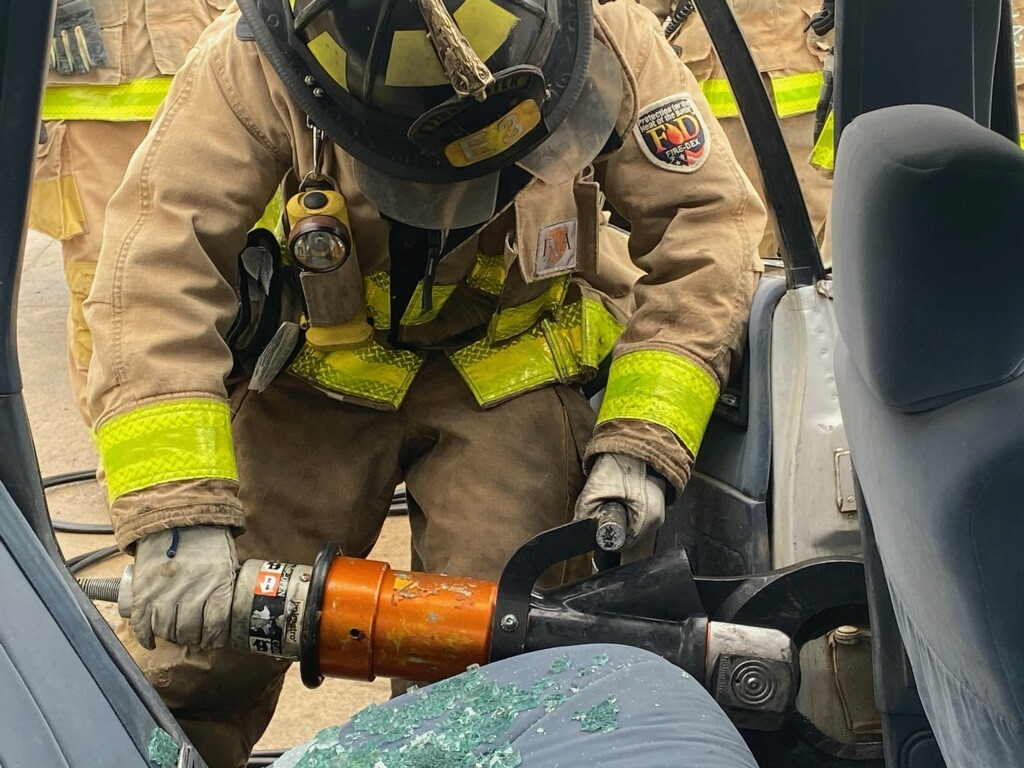 A Topeka firefighter hard at work during vehicle extrication training in March 2020.