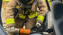 A Topeka firefighter hard at work during vehicle extrication training in March 2020.