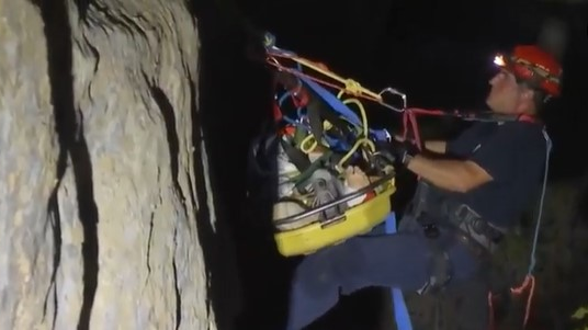 Billings, MT, firefighters lowered a gurney to rescue a climber who fell 60 feet while rappelling off Rimrocks at Sword Park on Tuesday.