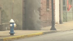 Bluefield, WV, firefighters evacuated part of the downtown area after three explosions erupted from a manhole Wednesday.