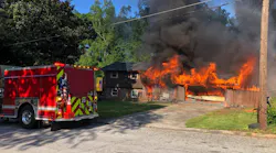 A DeKalb County, GA, firefighter was injured while battling a blaze that broke out at two houses Friday.