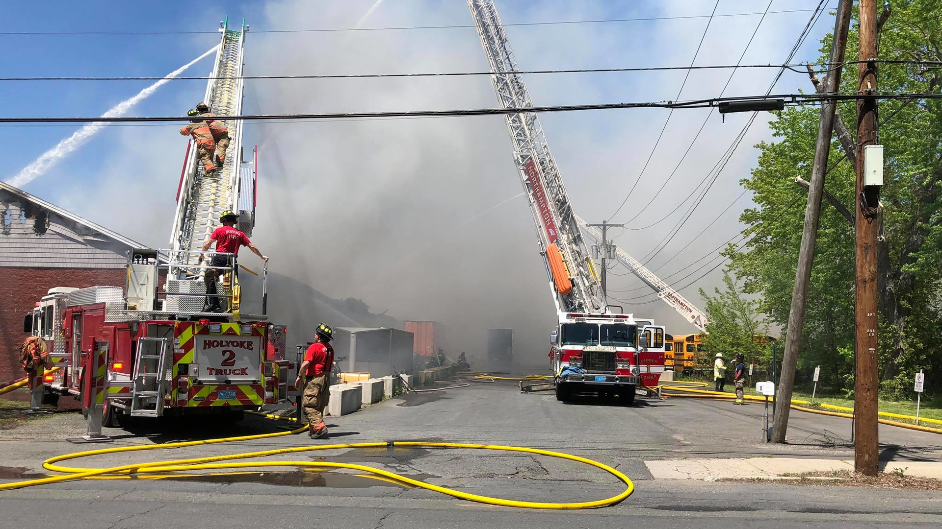 Nine fire departments responded to a five-alarm blaze that broke out at an Easthampton, MA, industrial building Friday.