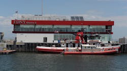 FDNY firefighters aboard Marine 9 rescued two boaters whose vessel capsized Saturday. FDNY firefighters aboard Marine 9 rescued two boaters whose vessel capsized Saturday.