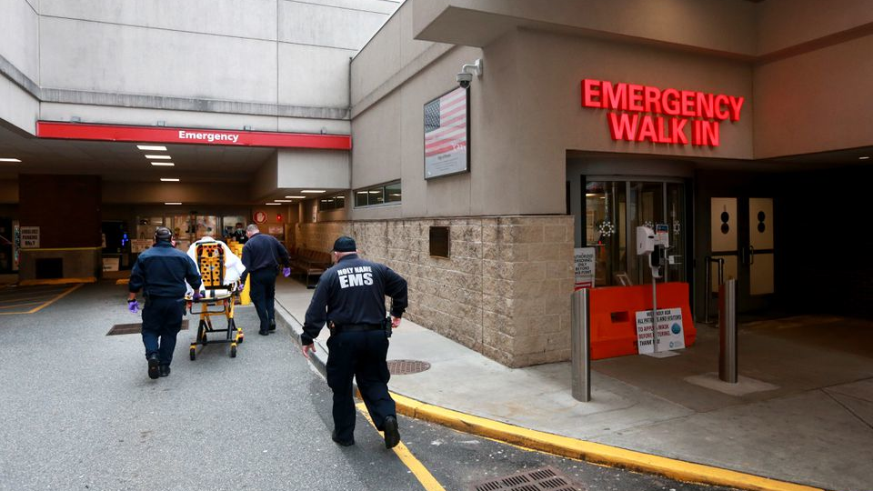 EMTs bring a patient to the emergency room at Hackensack University Medical Center in New Jersey.
