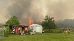 Two firefighters were injured battling a wildfire in Harrison County, MS, on Thursday.