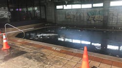 Two Joplin, MO, firefighters escaped injury after falling into a swimming pool filled with rancid water while battling a blaze at a vacant hotel Friday. Two Joplin, MO, firefighters escaped injury after falling into a swimming pool filled with rancid water while battling a blaze at a vacant hotel Friday.