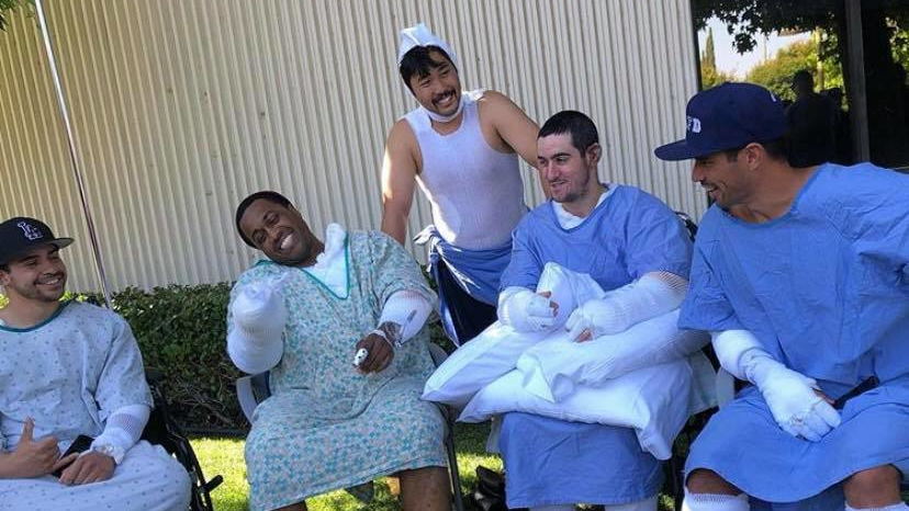 Five of the Los Angeles firefighters who were injured during a massive explosion at a smoke shop supply warehouse May 16.