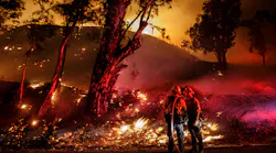 Firefighters monitor a controlled burn as they work to contain the spread of the Maria wildfire in Santa Paula, CA, on Nov. 1, 2019.