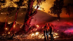 Firefighters monitor a controlled burn as they work to contain the spread of the Maria wildfire in Santa Paula, CA, on Nov. 1, 2019. Firefighters monitor a controlled burn as they work to contain the spread of the Maria wildfire in Santa Paula, CA, on Nov. 1, 2019.
