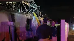 A Phoenix firefighter was taken the hospital in stable condition after he was injured by a falling ceiling beam during a house blaze late Saturday.
