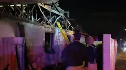 A Phoenix firefighter was taken the hospital in stable condition after he was injured by a falling ceiling beam during a house blaze late Saturday.