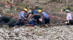 Pittsburgh firefighters, police and EMS workers rescued a construction manager who fell down a 150-foot hillside into a gully Friday.