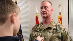 The son of Lexington, KY, Battalion Chief Rob Larkin pins the rank of brigadier general onto his father’s chest during a promotion ceremony in Frankfort in March. The son of Lexington, KY, Battalion Chief Rob Larkin pins the rank of brigadier general onto his father’s chest during a promotion ceremony in Frankfort in March.