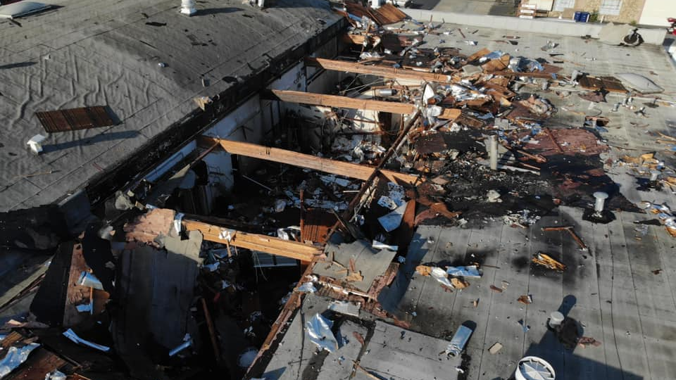 Firefighters battled a blaze early Thursday following an explosion at a where suspected illegal &ldquo;honey oil&rdquo; was being extracted from marijuana.