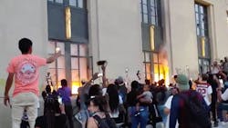 Firefighters responded to a blaze started by protesters at Nashville's Metro Courthouse on Saturday. Firefighters responded to a blaze started by protesters at Nashville's Metro Courthouse on Saturday.